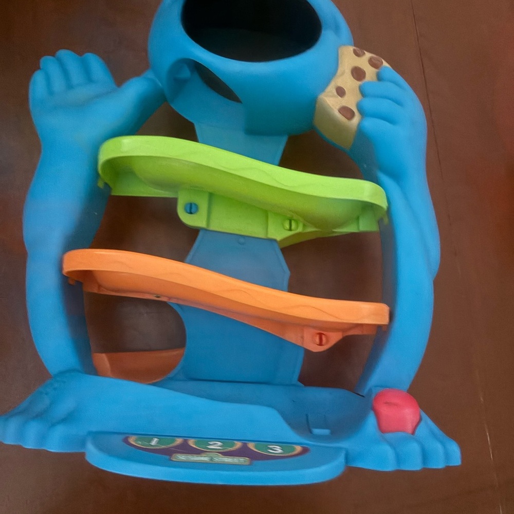 Blue Ball Drop Ramp Toy with Green and Orange Tracks
